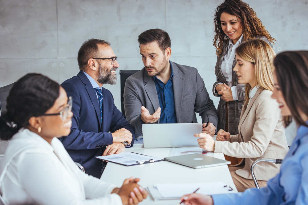 a,group,of,diverse,business,professionals,in,smart,attire,discuss